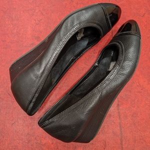 Cole Haan black leather pumps